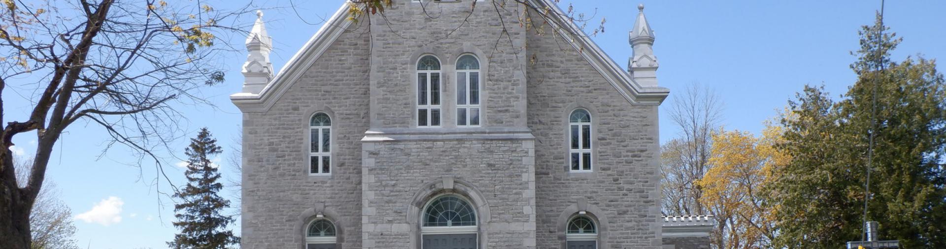 grey stone church in Crysler