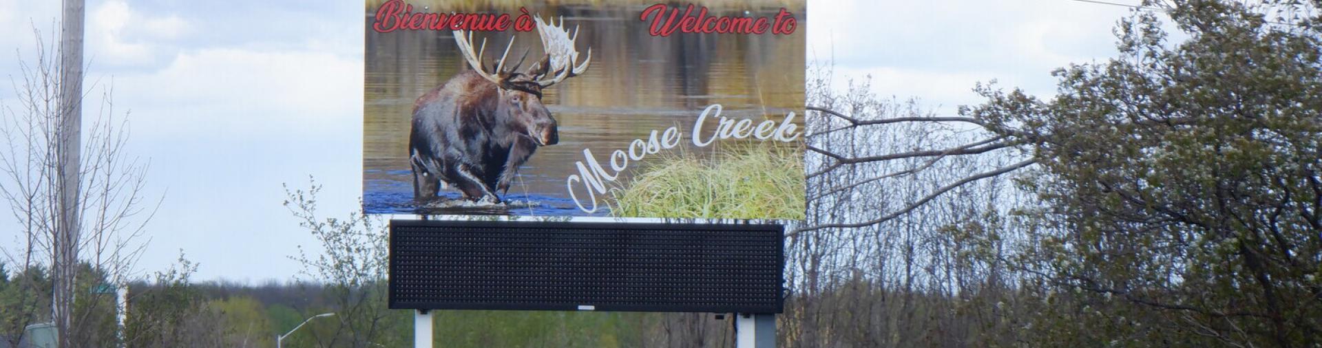 Welcome to Moose Creek sign