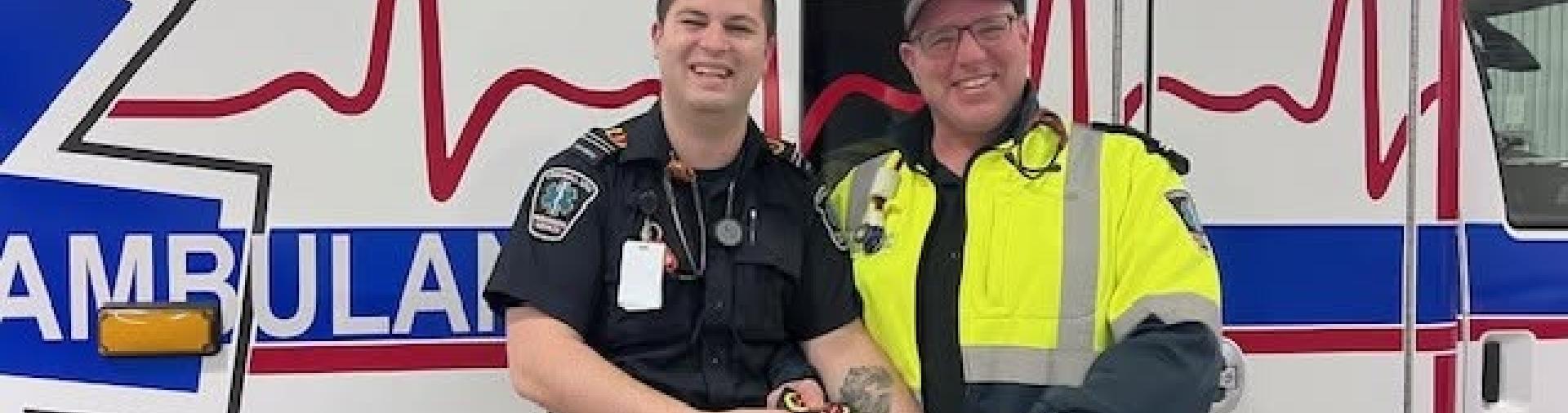 Cornwall paramedics standing by an ambulance
