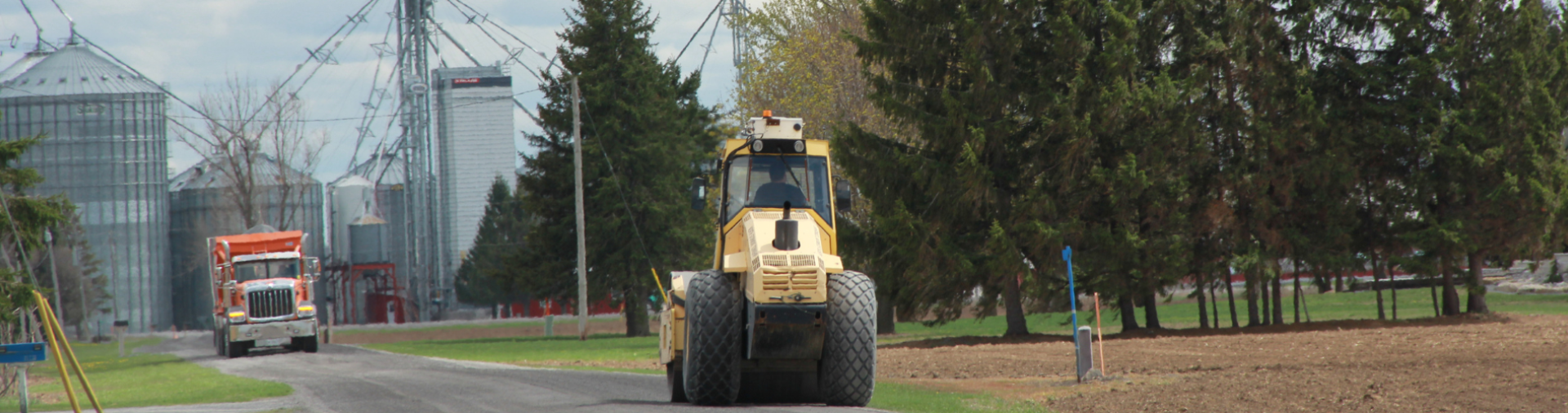 a truck working on a road