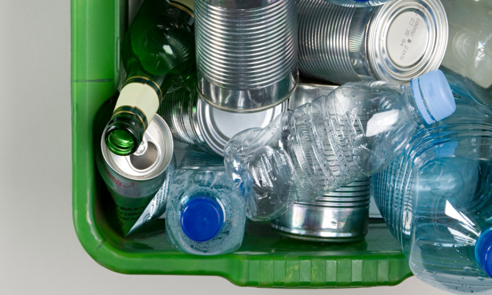 Recycling box containing cans and bottles.