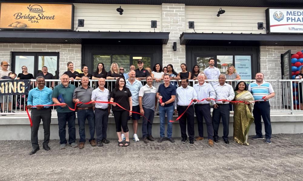 ribbon cutting at the commercial triplex in Crysler