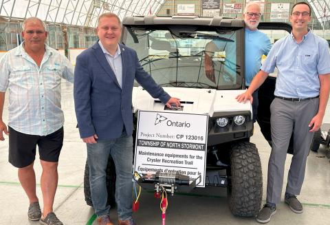 from left, are Crysler Recreation’s Pierre Thibault, Councillor Adrian Bugelli, Crysler Recreation Trail Volunteer Andre Lavictoire and MPP Nolan Quinn, showing off the new trail mower.